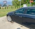 Черный Опель Инсигния, объемом двигателя 2 л и пробегом 317 тыс. км за 8400 $, фото 1 на Automoto.ua