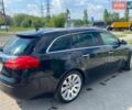 Черный Опель Инсигния, объемом двигателя 2 л и пробегом 317 тыс. км за 8400 $, фото 4 на Automoto.ua