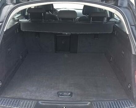 Черный Опель Инсигния, объемом двигателя 2 л и пробегом 400 тыс. км за 7500 $, фото 5 на Automoto.ua