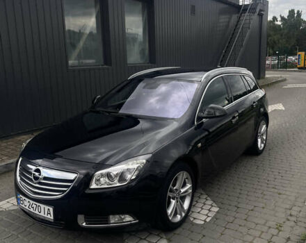 Черный Опель Инсигния, объемом двигателя 1.96 л и пробегом 300 тыс. км за 10400 $, фото 11 на Automoto.ua