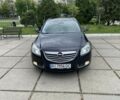 Черный Опель Инсигния, объемом двигателя 2 л и пробегом 303 тыс. км за 7700 $, фото 1 на Automoto.ua
