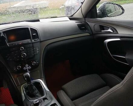 Черный Опель Инсигния, объемом двигателя 2 л и пробегом 258 тыс. км за 7000 $, фото 2 на Automoto.ua