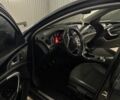 Черный Опель Инсигния, объемом двигателя 2 л и пробегом 280 тыс. км за 5700 $, фото 4 на Automoto.ua