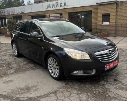 Чорний Опель Інсігнія, об'ємом двигуна 2 л та пробігом 333 тис. км за 10150 $, фото 1 на Automoto.ua