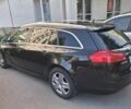 Чорний Опель Інсігнія, об'ємом двигуна 2 л та пробігом 290 тис. км за 7524 $, фото 4 на Automoto.ua