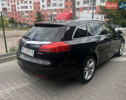 Черный Опель Инсигния, объемом двигателя 1.96 л и пробегом 300 тыс. км за 10400 $, фото 4 на Automoto.ua