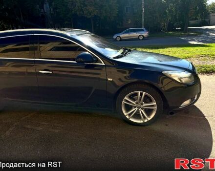 Чорний Опель Інсігнія, об'ємом двигуна 2 л та пробігом 29000 тис. км за 7250 $, фото 3 на Automoto.ua