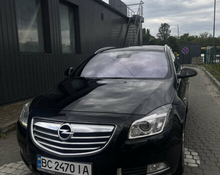 Черный Опель Инсигния, объемом двигателя 1.96 л и пробегом 300 тыс. км за 10400 $, фото 9 на Automoto.ua