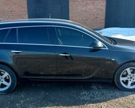 Чорний Опель Інсігнія, об'ємом двигуна 1.96 л та пробігом 225 тис. км за 6850 $, фото 9 на Automoto.ua