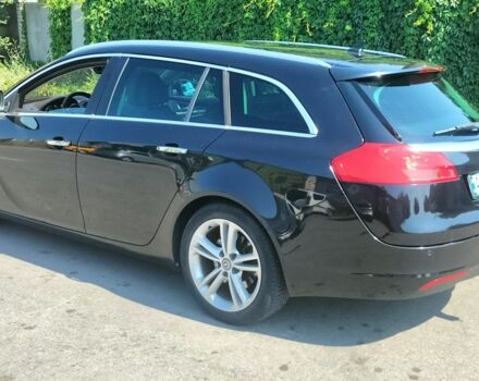 Чорний Опель Інсігнія, об'ємом двигуна 2 л та пробігом 200 тис. км за 8300 $, фото 1 на Automoto.ua