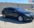 Чорний Опель Інсігнія, об'ємом двигуна 1.96 л та пробігом 250 тис. км за 8999 $, фото 2 на Automoto.ua