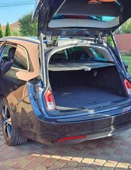 Чорний Опель Інсігнія, об'ємом двигуна 1.96 л та пробігом 275 тис. км за 7500 $, фото 5 на Automoto.ua