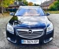 Чорний Опель Інсігнія, об'ємом двигуна 2 л та пробігом 243 тис. км за 8000 $, фото 1 на Automoto.ua
