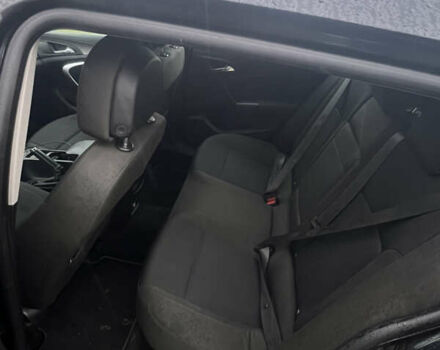 Чорний Опель Інсігнія, об'ємом двигуна 1.96 л та пробігом 215 тис. км за 7777 $, фото 3 на Automoto.ua