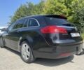 Чорний Опель Інсігнія, об'ємом двигуна 2 л та пробігом 340 тис. км за 6900 $, фото 1 на Automoto.ua