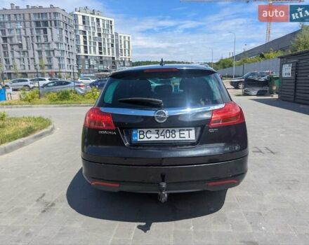 Черный Опель Инсигния, объемом двигателя 1.96 л и пробегом 339 тыс. км за 7700 $, фото 3 на Automoto.ua