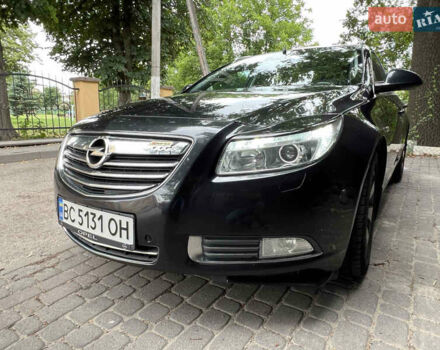 Черный Опель Инсигния, объемом двигателя 1.96 л и пробегом 230 тыс. км за 8500 $, фото 2 на Automoto.ua
