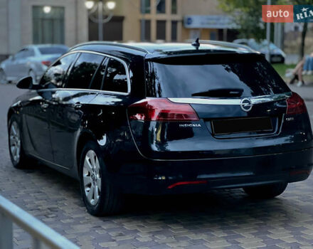 Опель Инсигния 2011 в Новоселица на Automoto.ua Черный Опель Инсигния, объемом двигателя 1.96 л и пробегом 378 тыс. км за 9200 $, фото 13 на Automoto.ua