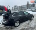 Чорний Опель Інсігнія, об'ємом двигуна 1.96 л та пробігом 252 тис. км за 9200 $, фото 4 на Automoto.ua