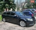 Черный Опель Инсигния, объемом двигателя 1.96 л и пробегом 239 тыс. км за 7500 $, фото 1 на Automoto.ua