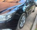Чорний Опель Інсігнія, об'ємом двигуна 1.96 л та пробігом 292 тис. км за 8800 $, фото 2 на Automoto.ua