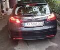 Чорний Опель Інсігнія, об'ємом двигуна 1.4 л та пробігом 250 тис. км за 7700 $, фото 2 на Automoto.ua