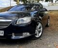 Черный Опель Инсигния, объемом двигателя 2 л и пробегом 228 тыс. км за 9700 $, фото 1 на Automoto.ua