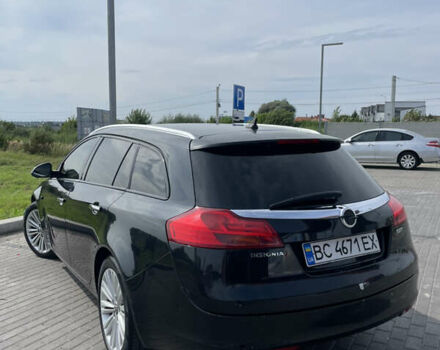 Чорний Опель Інсігнія, об'ємом двигуна 1.96 л та пробігом 251 тис. км за 8850 $, фото 13 на Automoto.ua