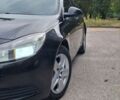 Чорний Опель Інсігнія, об'ємом двигуна 1.96 л та пробігом 240 тис. км за 6900 $, фото 2 на Automoto.ua