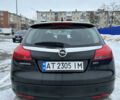 Чорний Опель Інсігнія, об'ємом двигуна 2 л та пробігом 262 тис. км за 7700 $, фото 4 на Automoto.ua