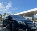 Чорний Опель Інсігнія, об'ємом двигуна 1.96 л та пробігом 208 тис. км за 12000 $, фото 6 на Automoto.ua