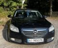 Черный Опель Инсигния, объемом двигателя 2 л и пробегом 331 тыс. км за 7600 $, фото 1 на Automoto.ua