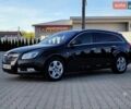 Чорний Опель Інсігнія, об'ємом двигуна 1.96 л та пробігом 240 тис. км за 9200 $, фото 1 на Automoto.ua
