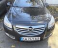 Черный Опель Инсигния, объемом двигателя 2 л и пробегом 304 тыс. км за 7700 $, фото 1 на Automoto.ua