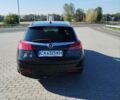 Чорний Опель Інсігнія, об'ємом двигуна 2 л та пробігом 270 тис. км за 10550 $, фото 1 на Automoto.ua