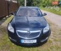 Чорний Опель Інсігнія, об'ємом двигуна 2 л та пробігом 264 тис. км за 8700 $, фото 1 на Automoto.ua