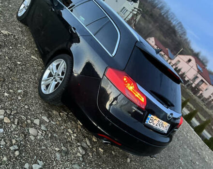 Чорний Опель Інсігнія, об'ємом двигуна 1.96 л та пробігом 255 тис. км за 7000 $, фото 14 на Automoto.ua