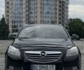 Чорний Опель Інсігнія, об'ємом двигуна 1.4 л та пробігом 185 тис. км за 7199 $, фото 1 на Automoto.ua