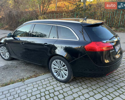 Чорний Опель Інсігнія, об'ємом двигуна 2 л та пробігом 261 тис. км за 8500 $, фото 8 на Automoto.ua