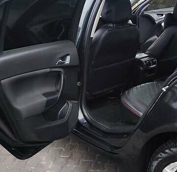 Черный Опель Инсигния, объемом двигателя 1.96 л и пробегом 245 тыс. км за 8599 $, фото 4 на Automoto.ua