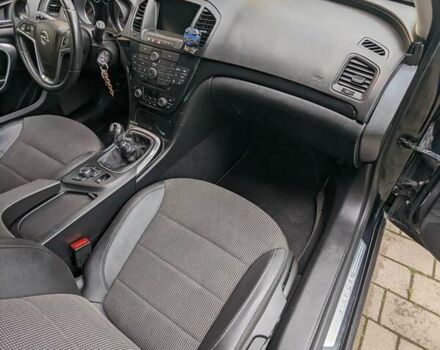 Черный Опель Инсигния, объемом двигателя 2 л и пробегом 230 тыс. км за 7800 $, фото 4 на Automoto.ua