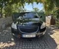 Чорний Опель Інсігнія, об'ємом двигуна 2 л та пробігом 320 тис. км за 7533 $, фото 2 на Automoto.ua