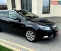 Чорний Опель Інсігнія, об'ємом двигуна 1.6 л та пробігом 191 тис. км за 8999 $, фото 1 на Automoto.ua
