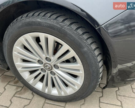 Черный Опель Инсигния, объемом двигателя 1.96 л и пробегом 255 тыс. км за 7700 $, фото 5 на Automoto.ua