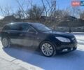 Чорний Опель Інсігнія, об'ємом двигуна 2 л та пробігом 277 тис. км за 9300 $, фото 1 на Automoto.ua