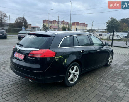 Чорний Опель Інсігнія, об'ємом двигуна 1.96 л та пробігом 140 тис. км за 7200 $, фото 3 на Automoto.ua