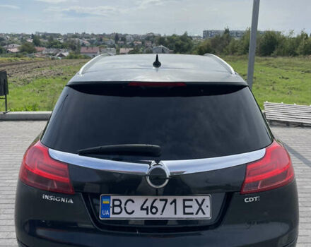 Чорний Опель Інсігнія, об'ємом двигуна 1.96 л та пробігом 256 тис. км за 8175 $, фото 16 на Automoto.ua