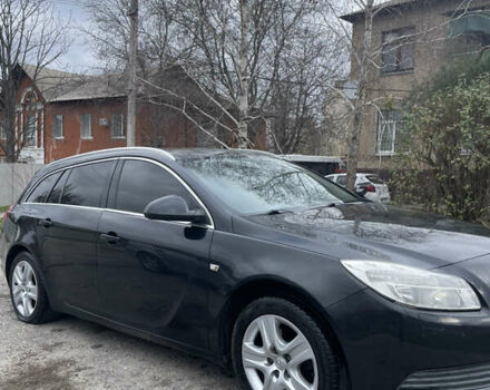 Чорний Опель Інсігнія, об'ємом двигуна 2 л та пробігом 220 тис. км за 7500 $, фото 4 на Automoto.ua