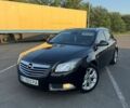 Чорний Опель Інсігнія, об'ємом двигуна 2 л та пробігом 255 тис. км за 8000 $, фото 1 на Automoto.ua