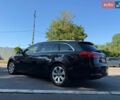 Чорний Опель Інсігнія, об'ємом двигуна 1.6 л та пробігом 191 тис. км за 9000 $, фото 8 на Automoto.ua